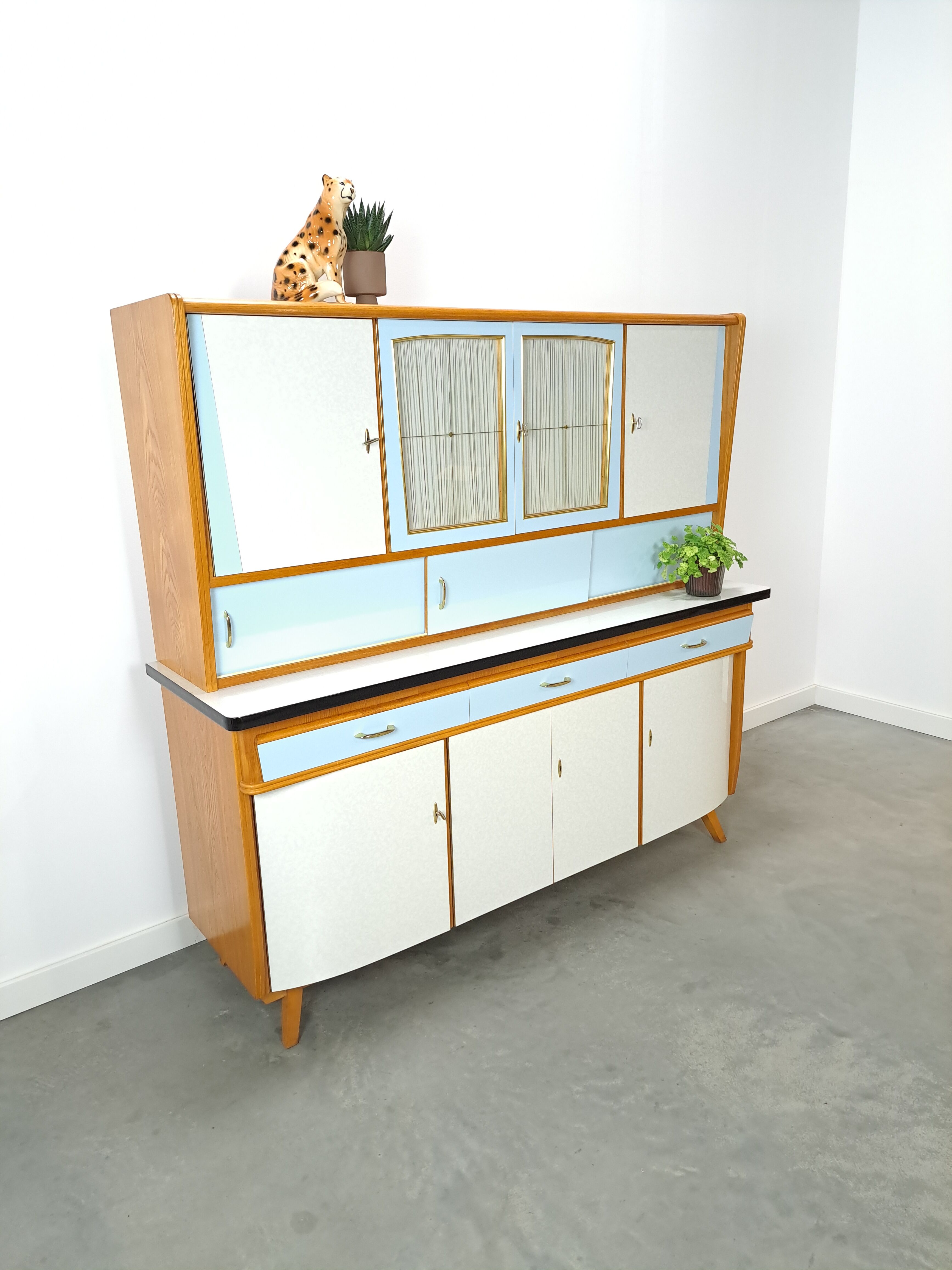 50s vintage kitchen cabinet with brass and formica