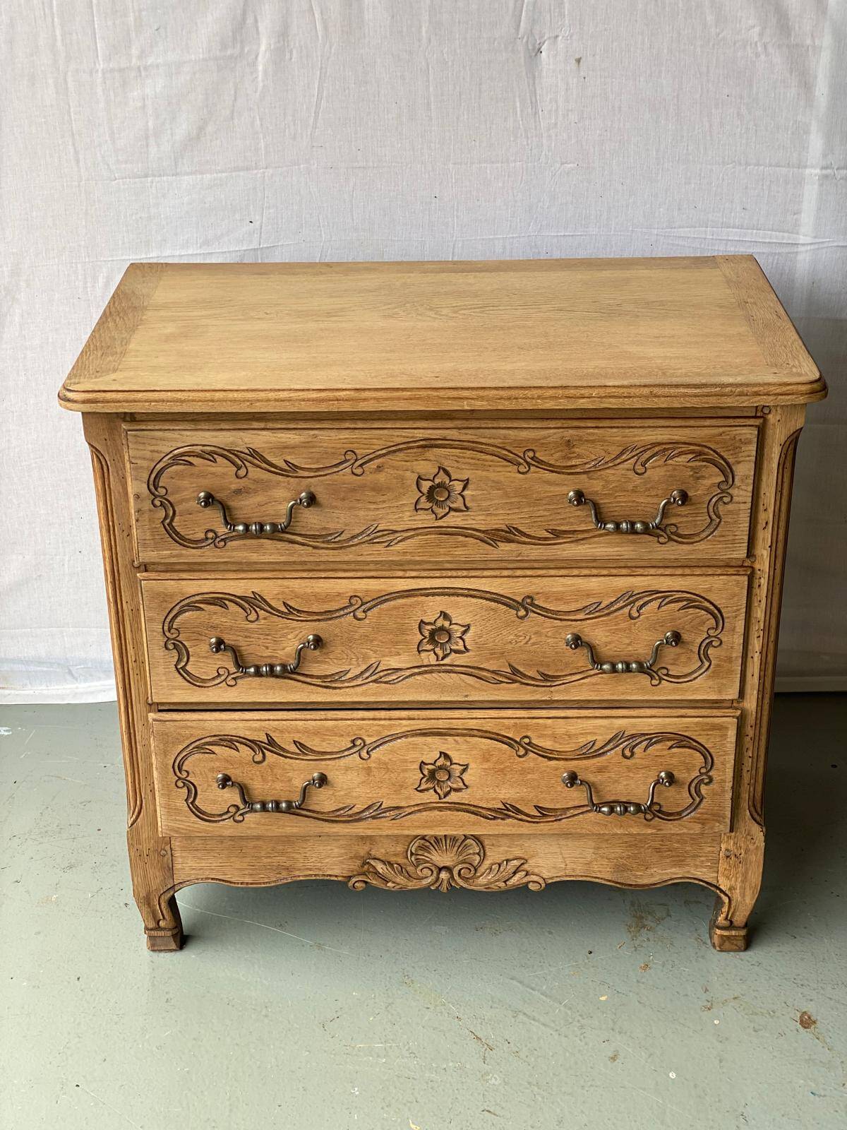 Vintage Louis XV chest of drawers renovated in raw and carved wood