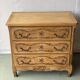 Vintage Louis XV chest of drawers renovated in raw and carved wood