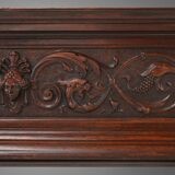 Richly decorated antique fireplace in oak, Belgium ca. 1920