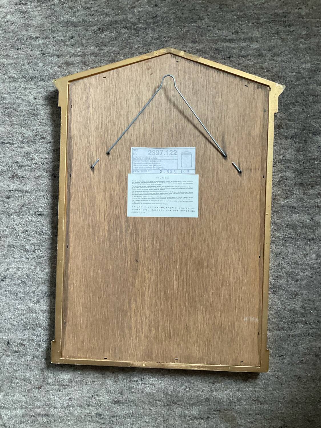 Vintage Deknudt Empire style mirror in gilded wood