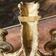 Monobloc gilded bronze wall light, grotesque satyr, two lights.