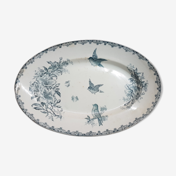 Large platter in earthenware with decoration of flowers and bird