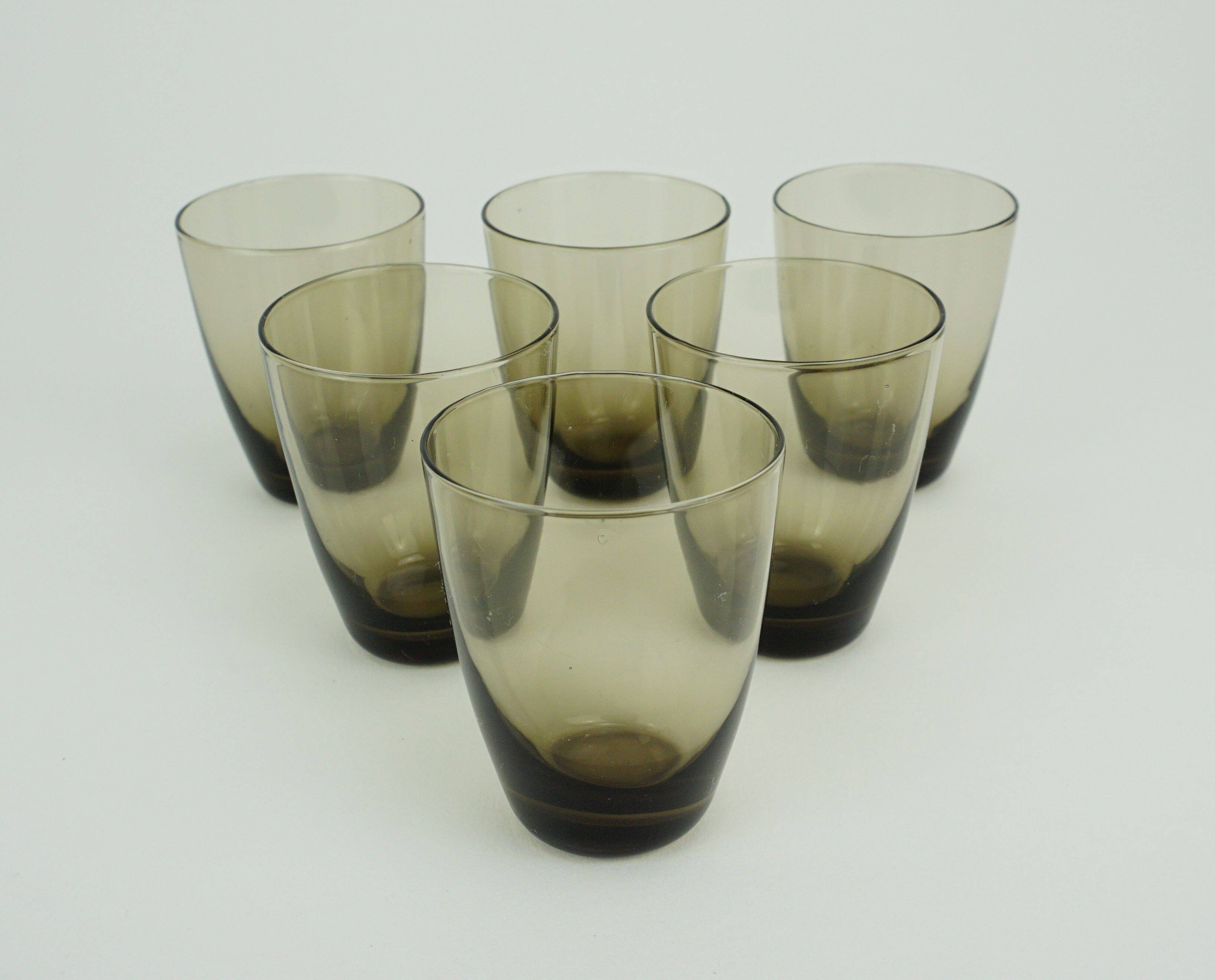 Set of 6 midcentury shot glasses in a brass holder with bamboo handle 1950s