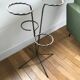 Wrought iron plant holders