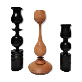 Three vintage light and dark wood candlesticks