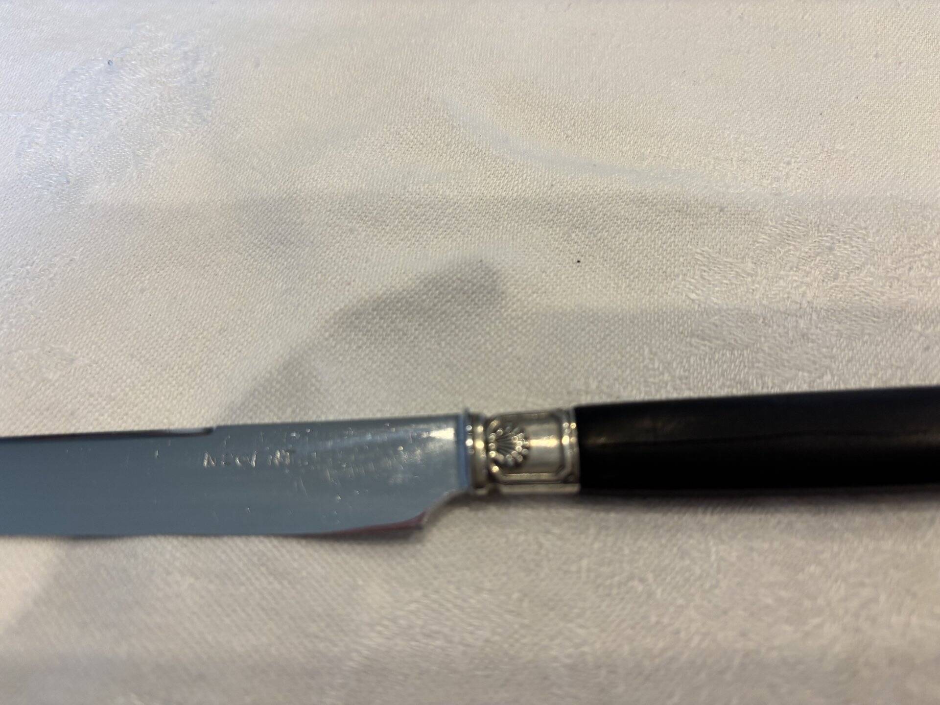 Empire-style knife set in ebony, with silver ferrules and pommels