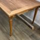 Dining table with tapered legs and solid exotic wood