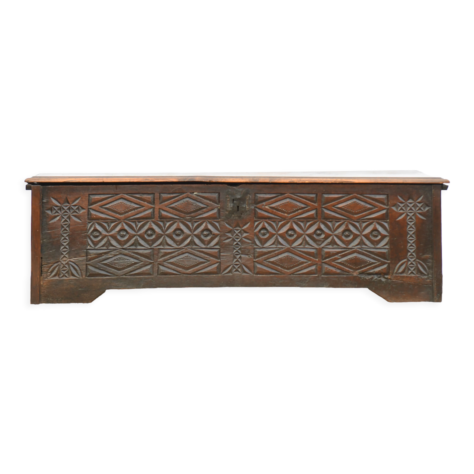 Antique chest in carved wood