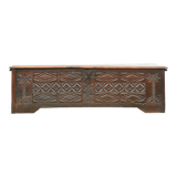Antique chest in carved wood
