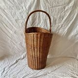 Old woven wicker umbrella stand