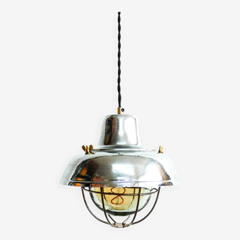 Small steel pendant light with lampshade.
