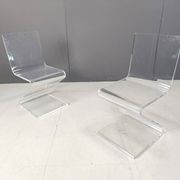 Pair of lucite zigzag dining chairs, 1980s