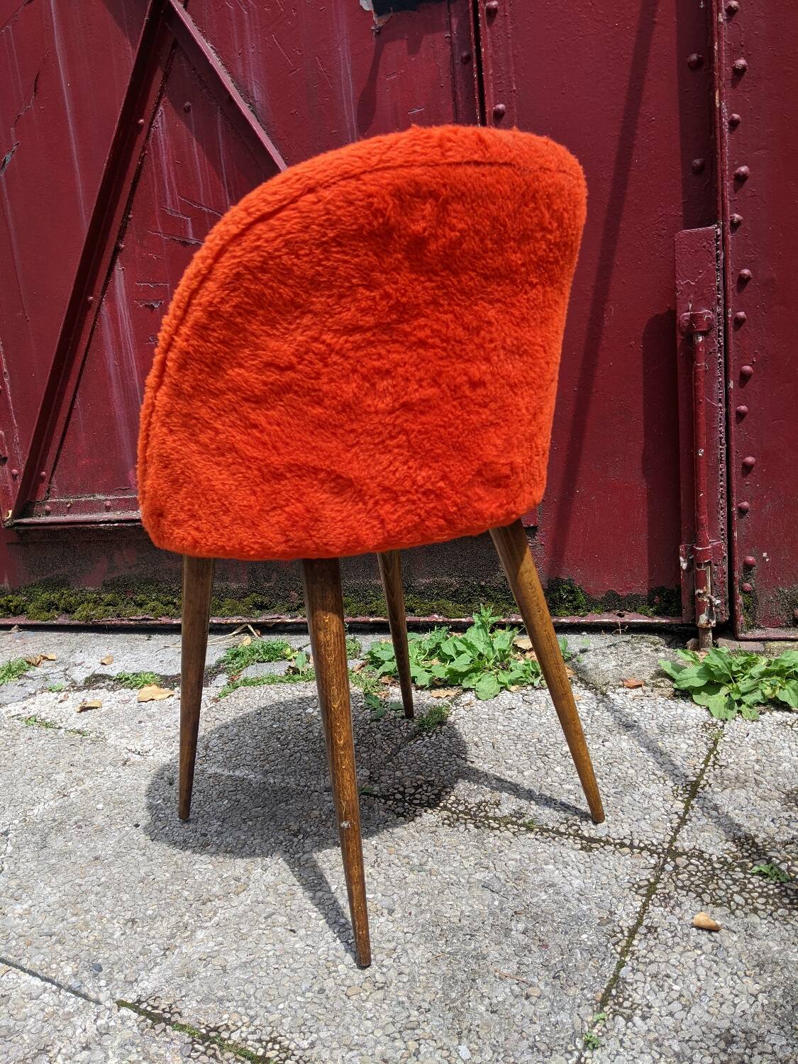 Orange furry barrel chair