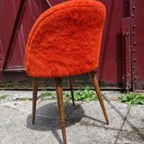 Orange furry barrel chair
