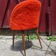 Orange furry barrel chair