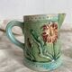 Small Art Nouveau slip milk pitcher