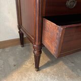 Louis XVI style commode with a shaped marble top.