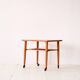 1960s teak coffee table on casters