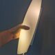 Wall lamp from Paulmann with white opal glass shade.