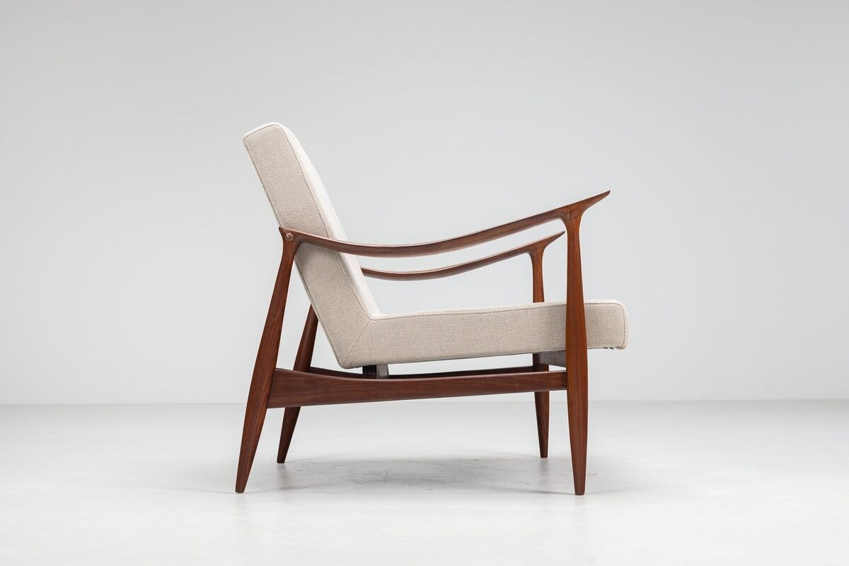 Sculptural Danish lounge chair in teak and fabric Denmark 1960