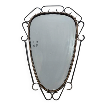 Mid-century modern iron mirror, brutalist, vintage organic, thick sixties.