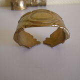 Six rounds of brass towel in their original box 1960  Art Deco