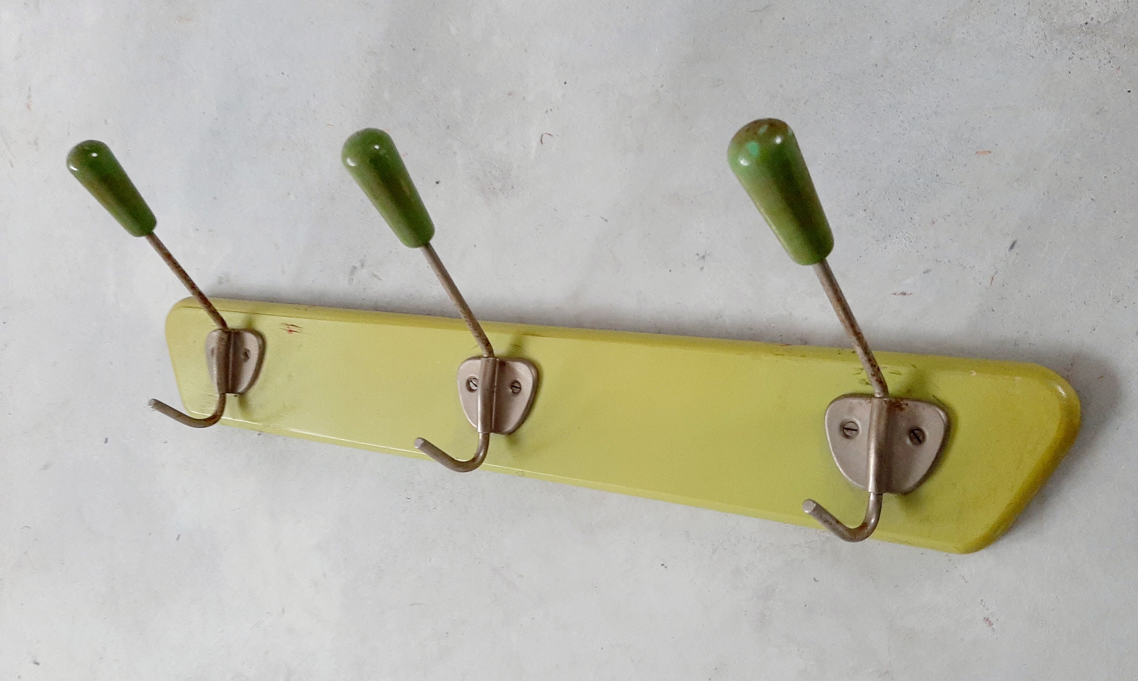 Green vintage coat rack