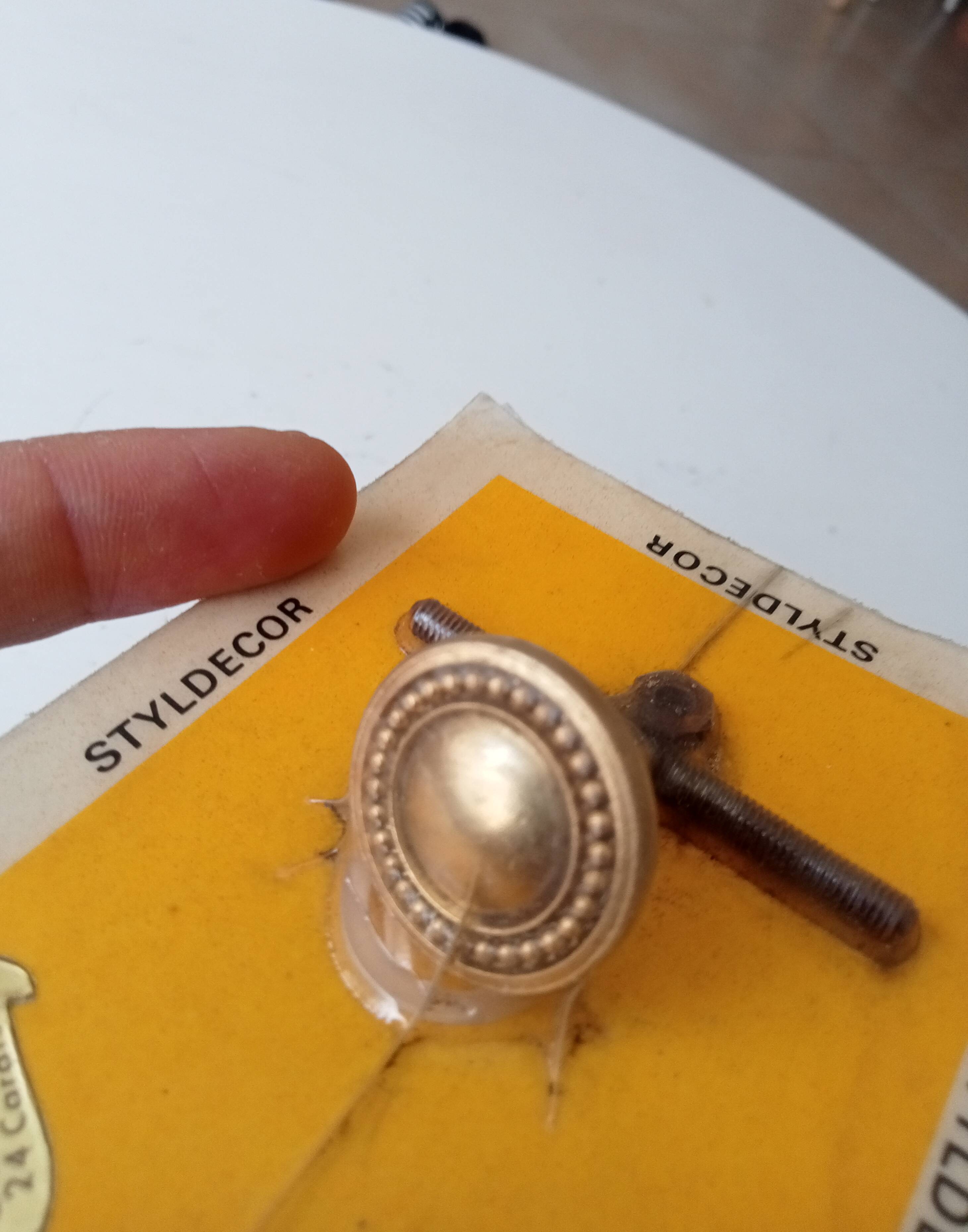 Vintage furniture knob in Louis XVI style, gilded with fine gold.