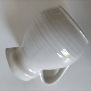Ceramic pitcher from Quimper, created by Dominique Villard.
