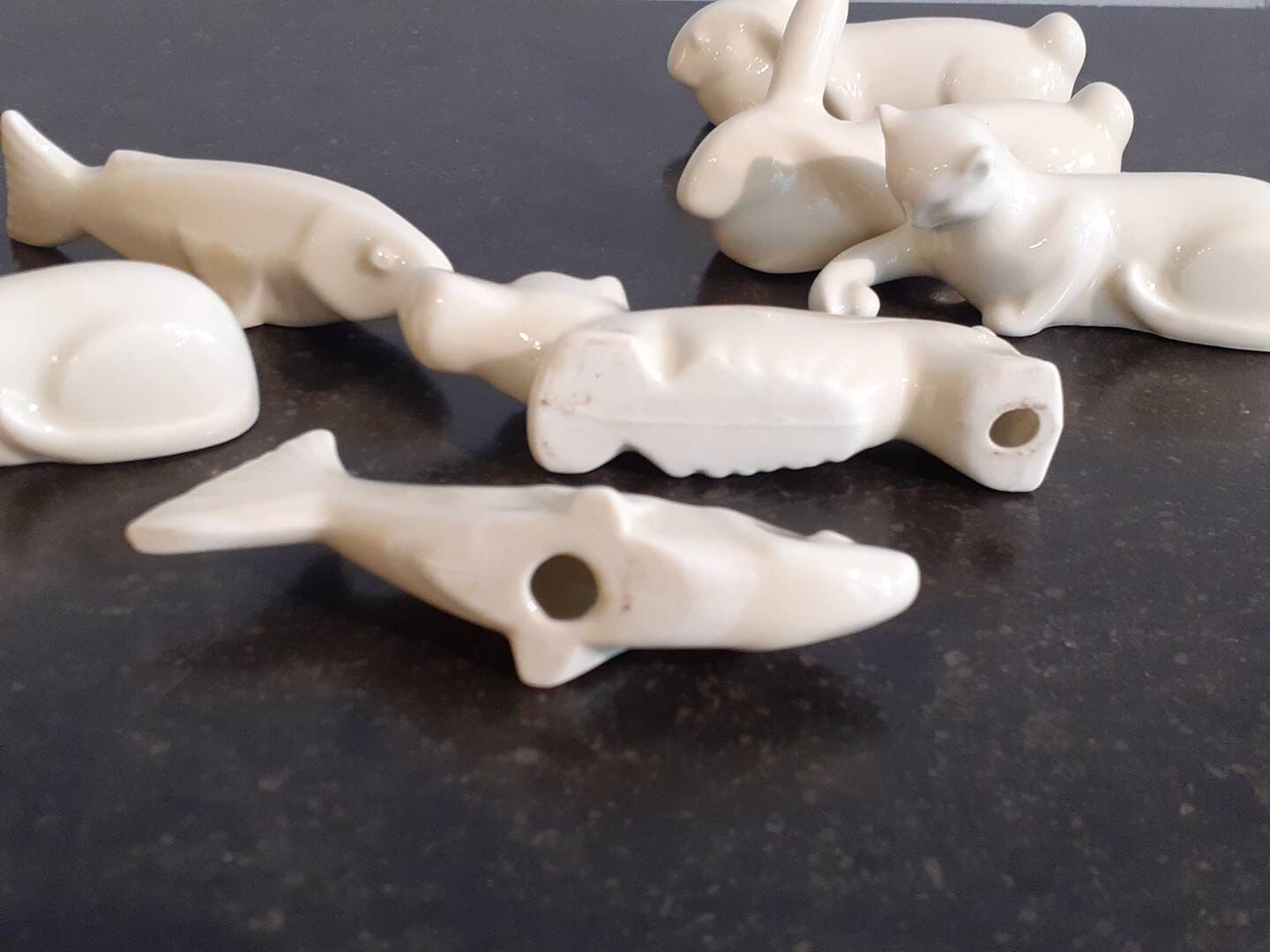 Set of 7 porcelain knife rests, animals, dog, cats, fish, rabbit.