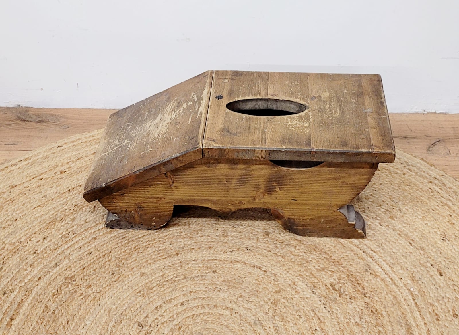 Old wooden footrest stool