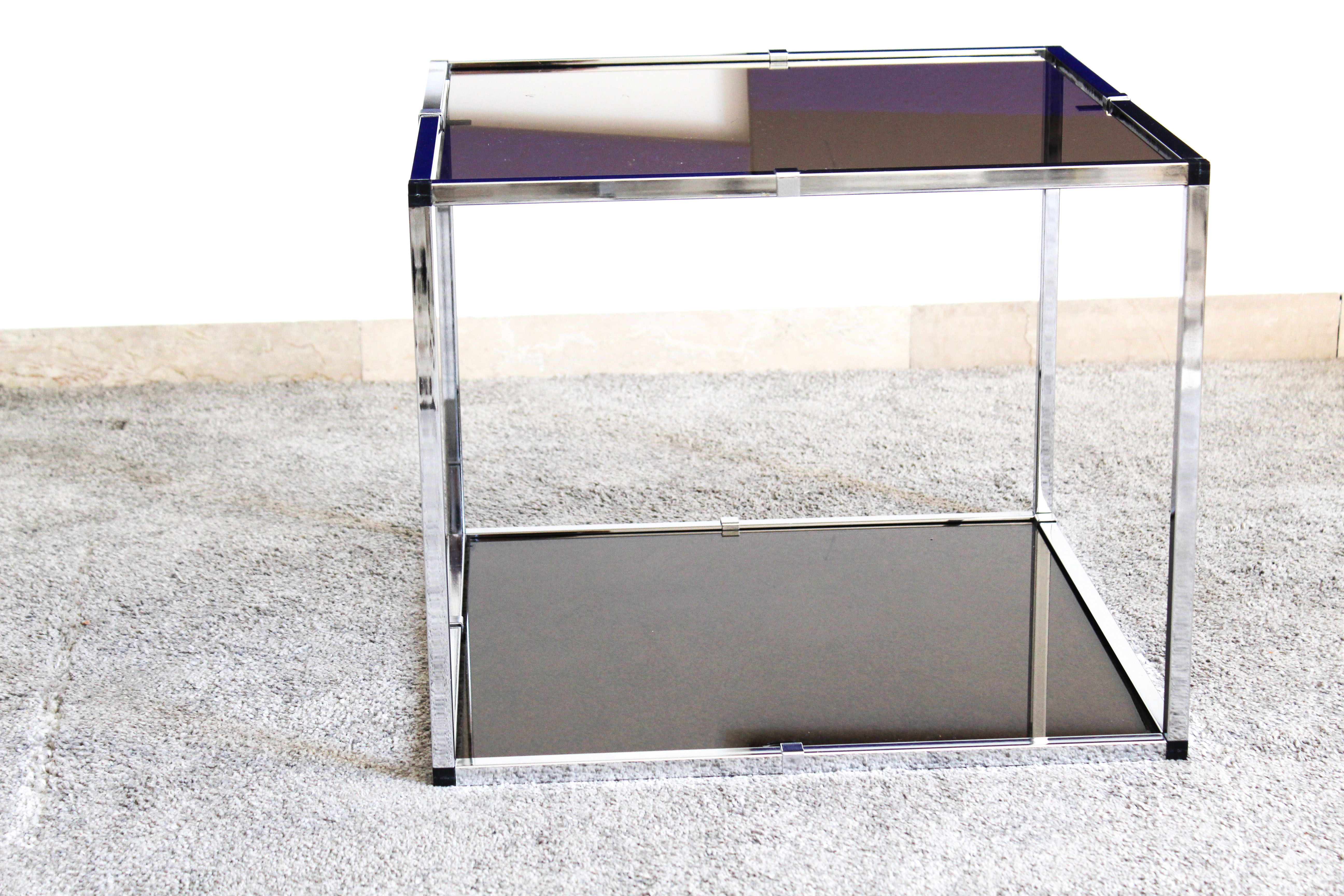 Pair of Coffee Tables in chromed metal and smoked glass, Italy 70's