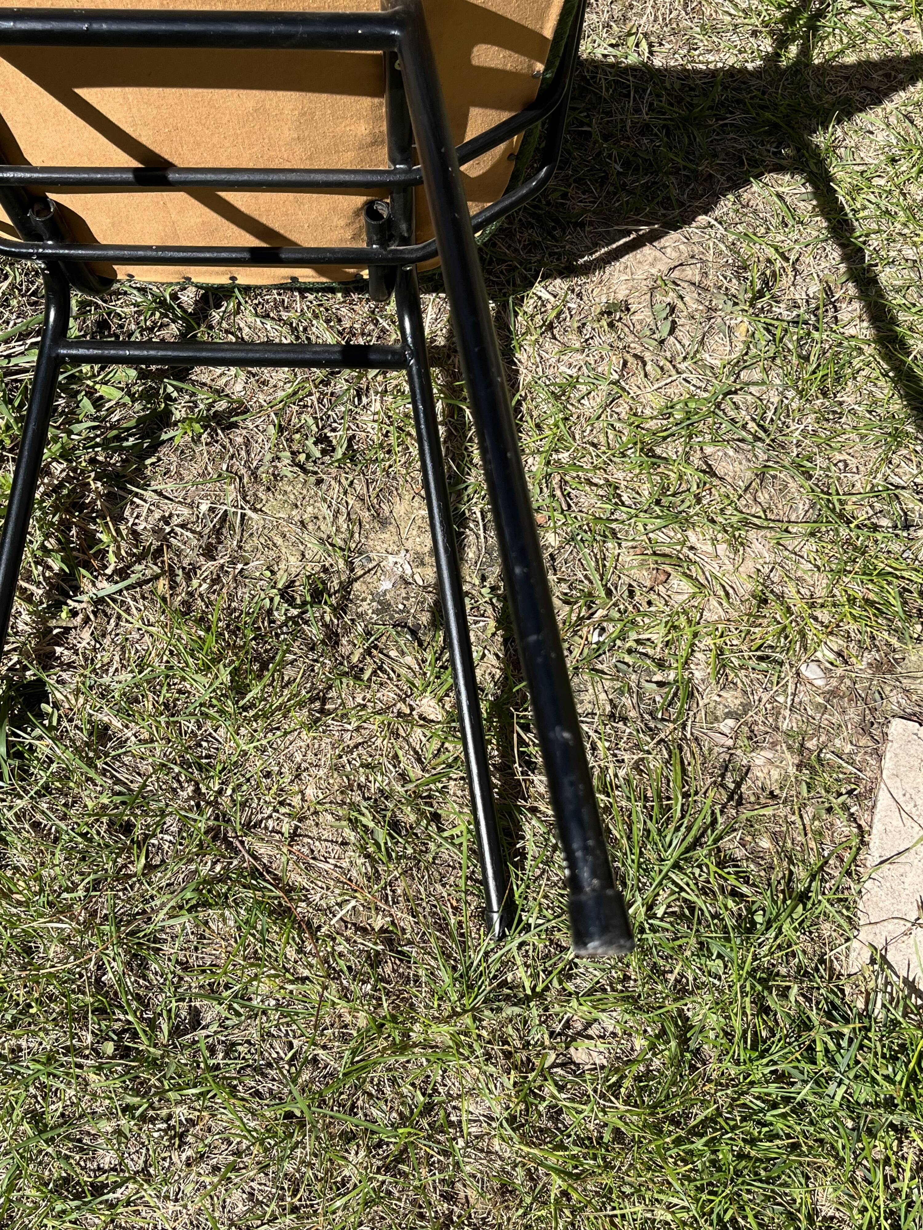 50s chair with armrests.