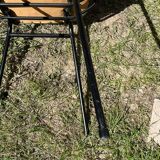 50s chair with armrests.