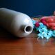Enamelled white stoneware bottle