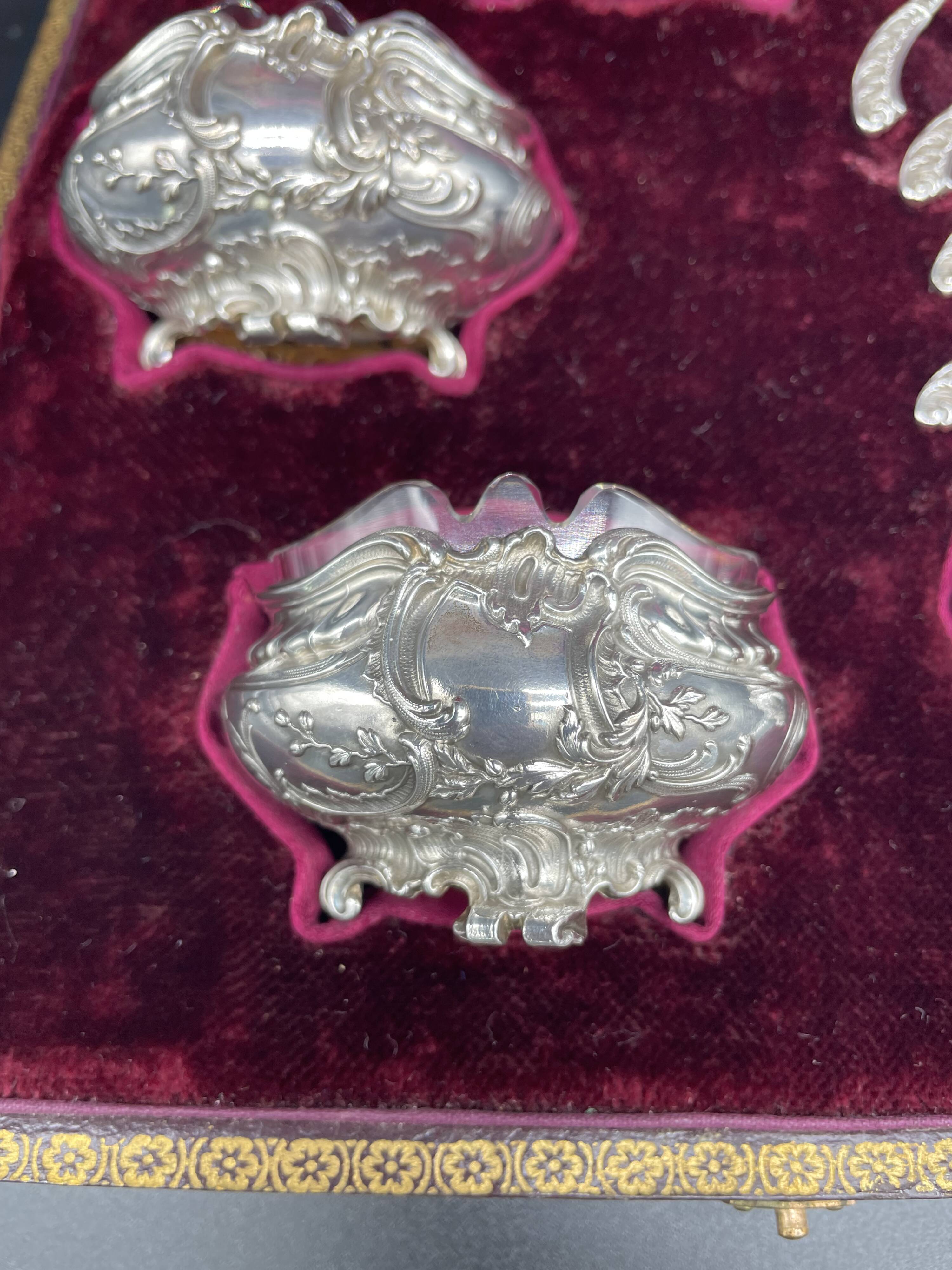 4 salt pots, silver, Ravinet D'enfert, 4 shovels, white glass interior, case, purple interior, 19th century
