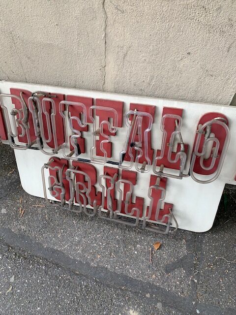 Buffalo Grill sign plate with neon
