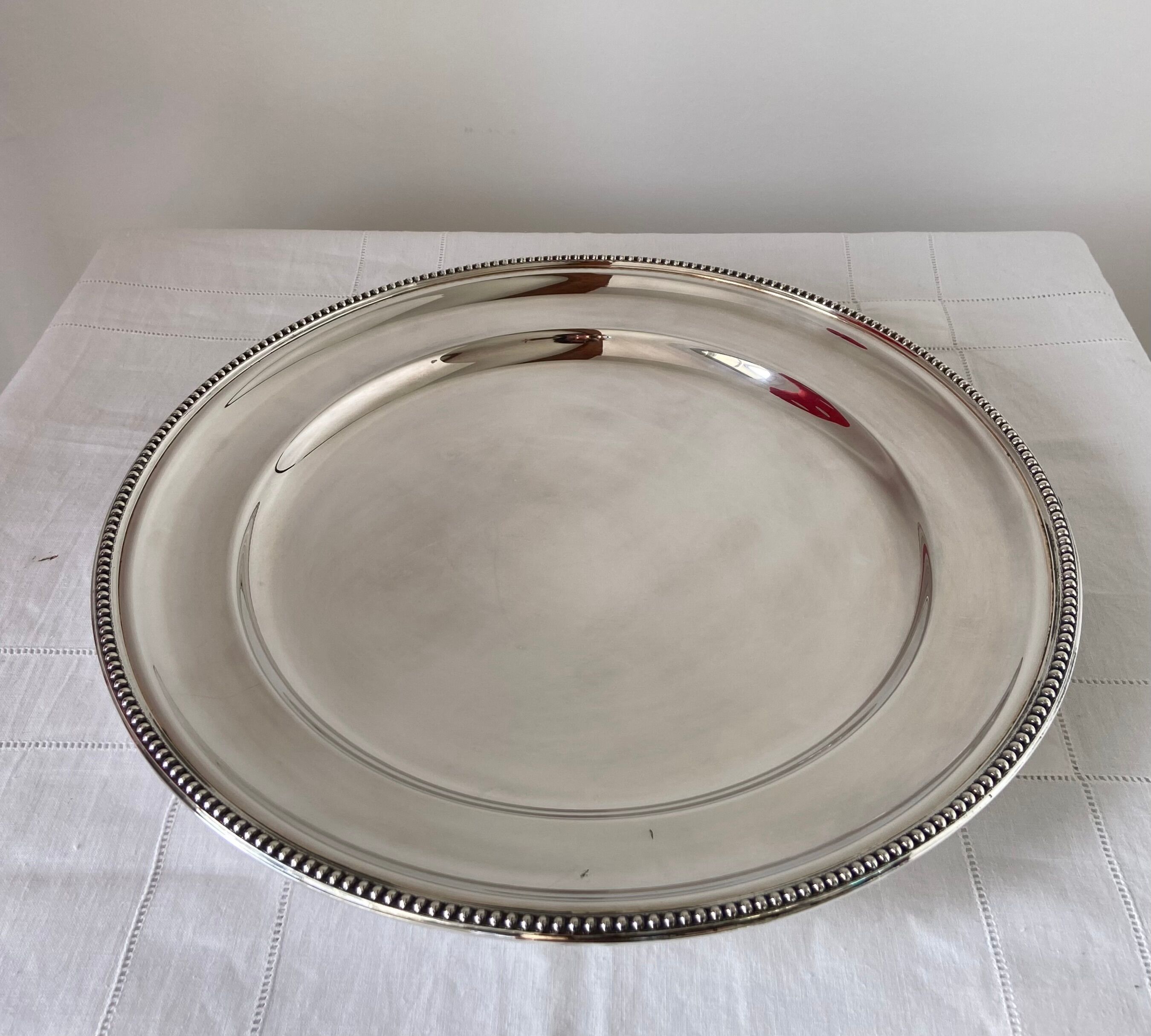 New round silver plated dish