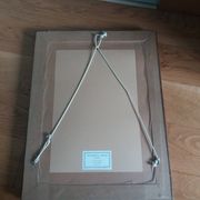 Old photo portrait framed in wood and stucco