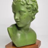 Bust of Eros in patinated plaster in imitation of bronze on wooden base