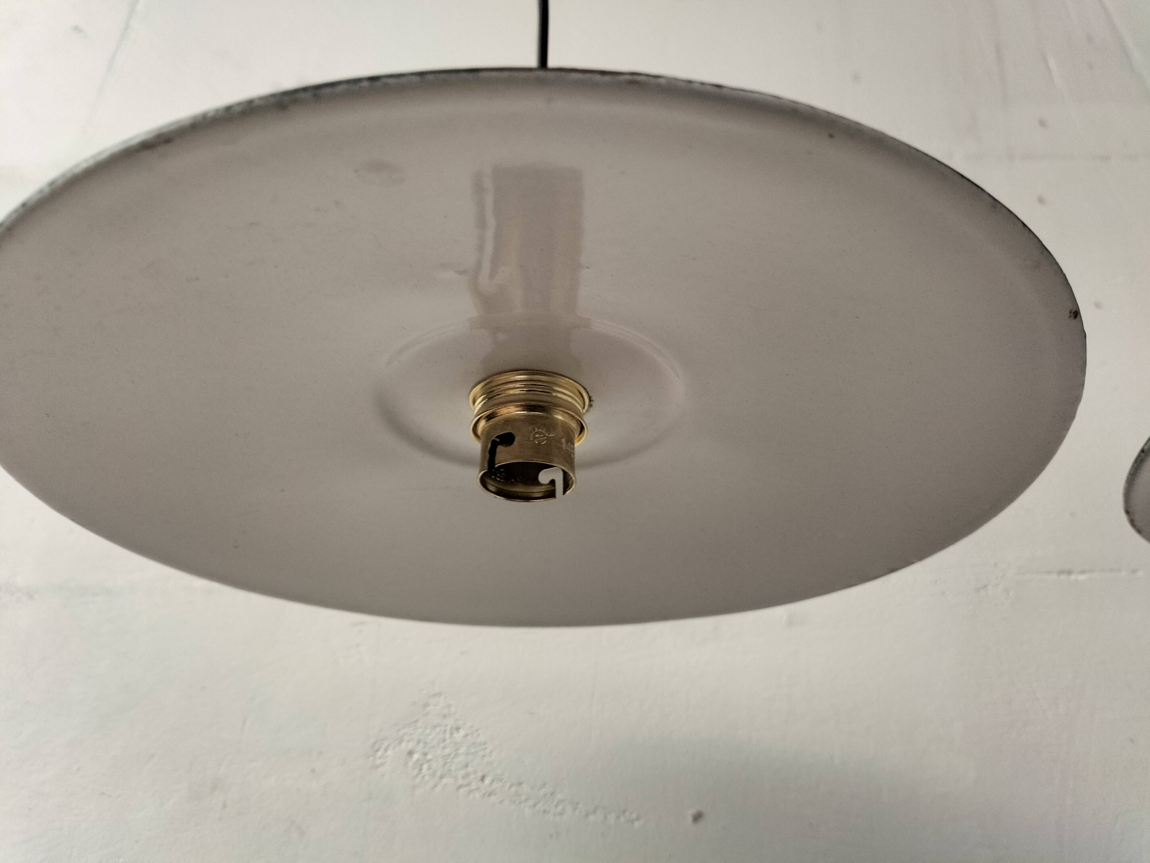 Enamelled sheet metal suspensions