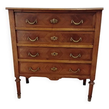Antique marquetry commode in the Louis XVI style.