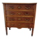 Antique marquetry commode in the Louis XVI style.