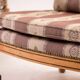 Pair of Giorgetti "1975 Gallery" armchairs in carved wood, original upholstery.
