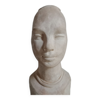 Bust of a woman in clay signed