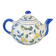 Blue teapot and yellow fruits