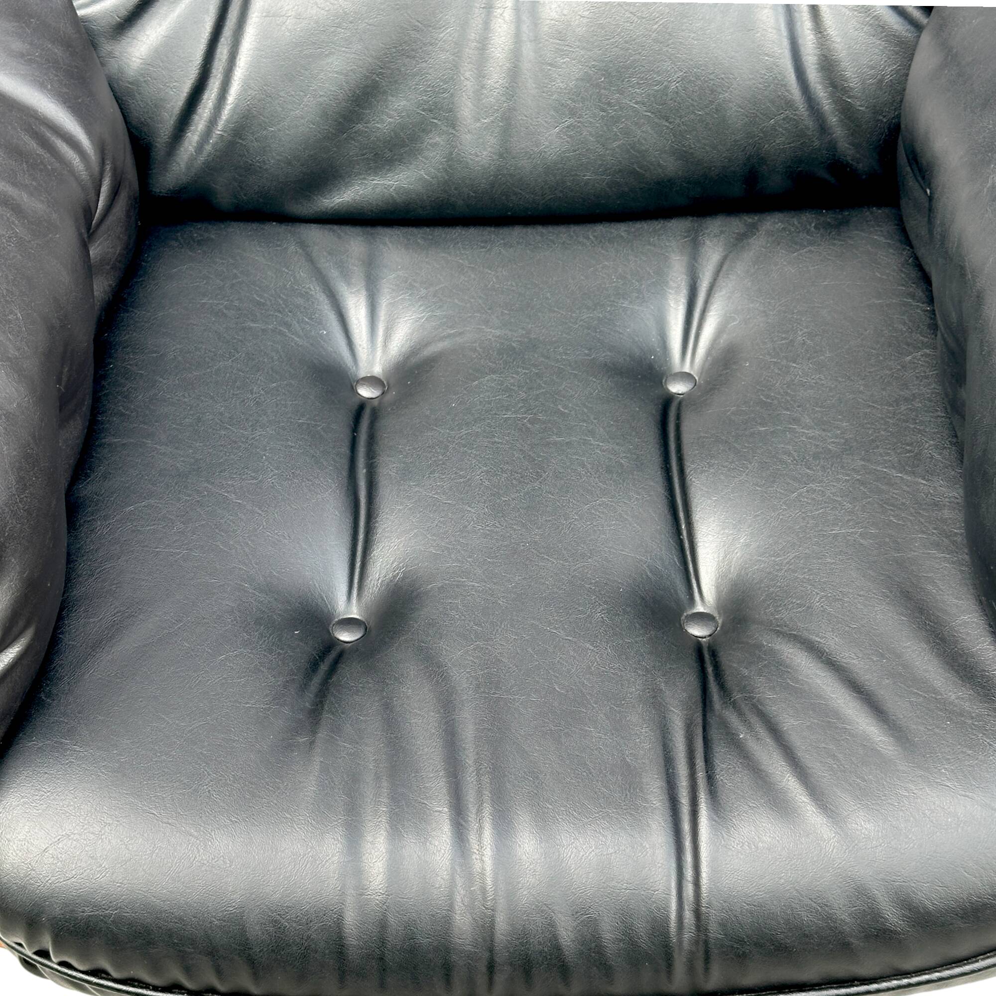 Vintage armchair in leather and rosewood inspired by Martin Stoll design 1970