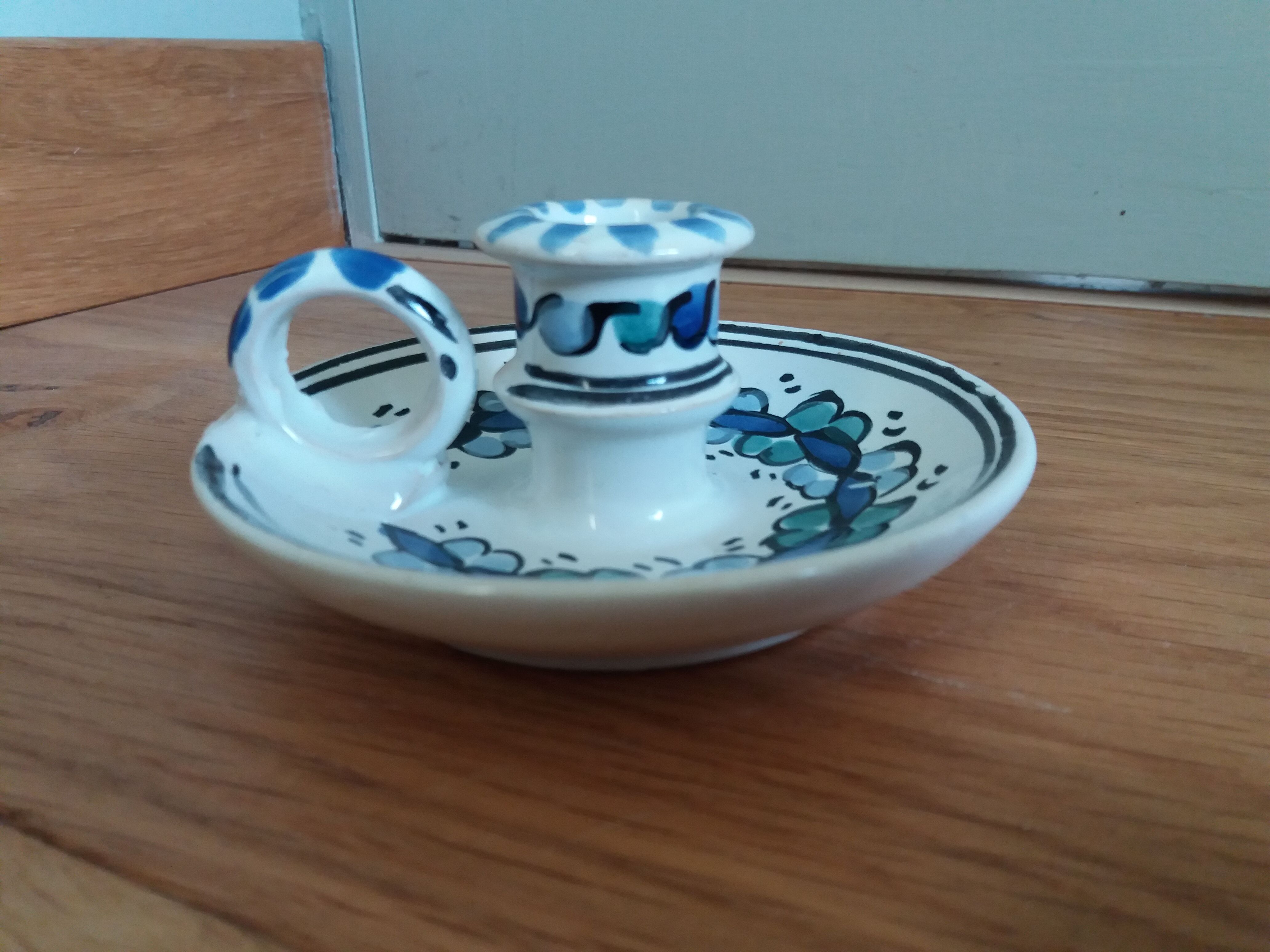 Cellar rat candle holder