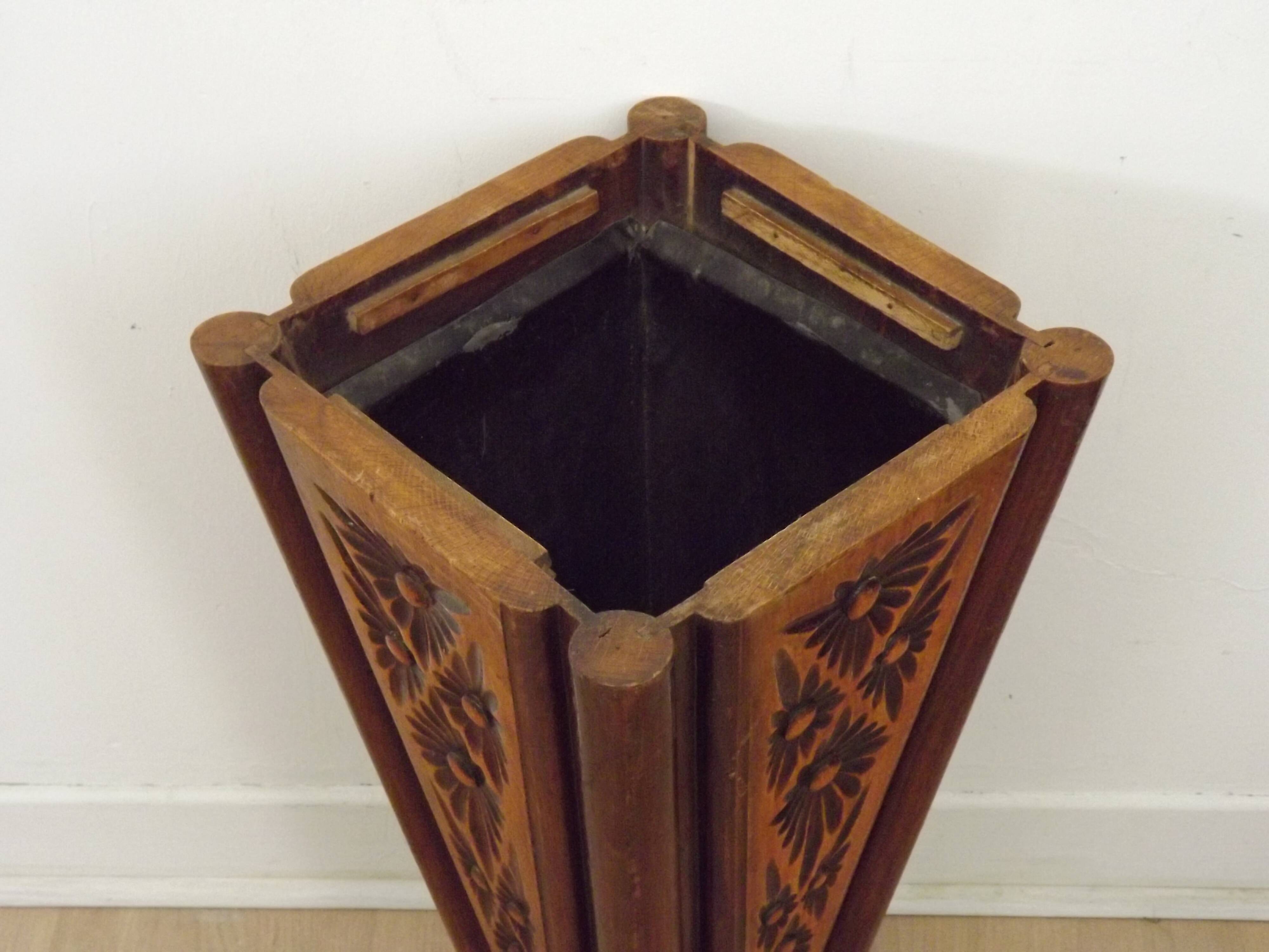 French antique oak tin-lined hand-carved umbrella stand with flower decoration.